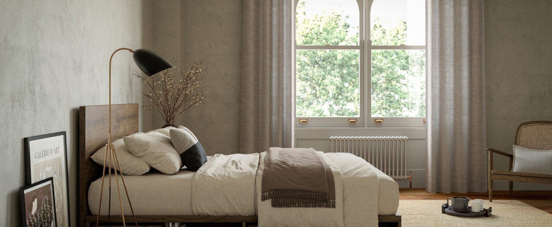 Wooden low bed frame in a neutral bedroom