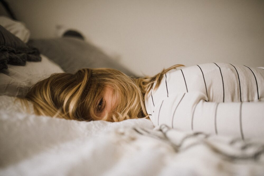 woman lying in bed