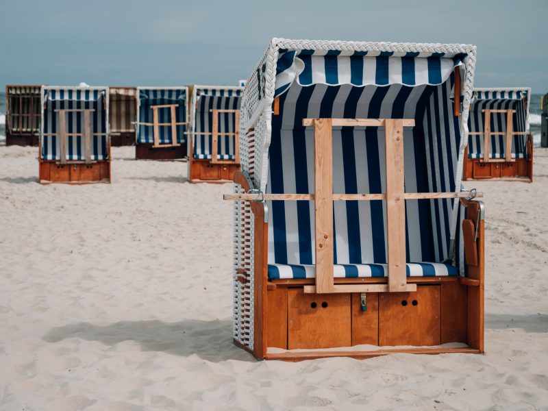 image of beach cabins to show nautical decor trend for 2021