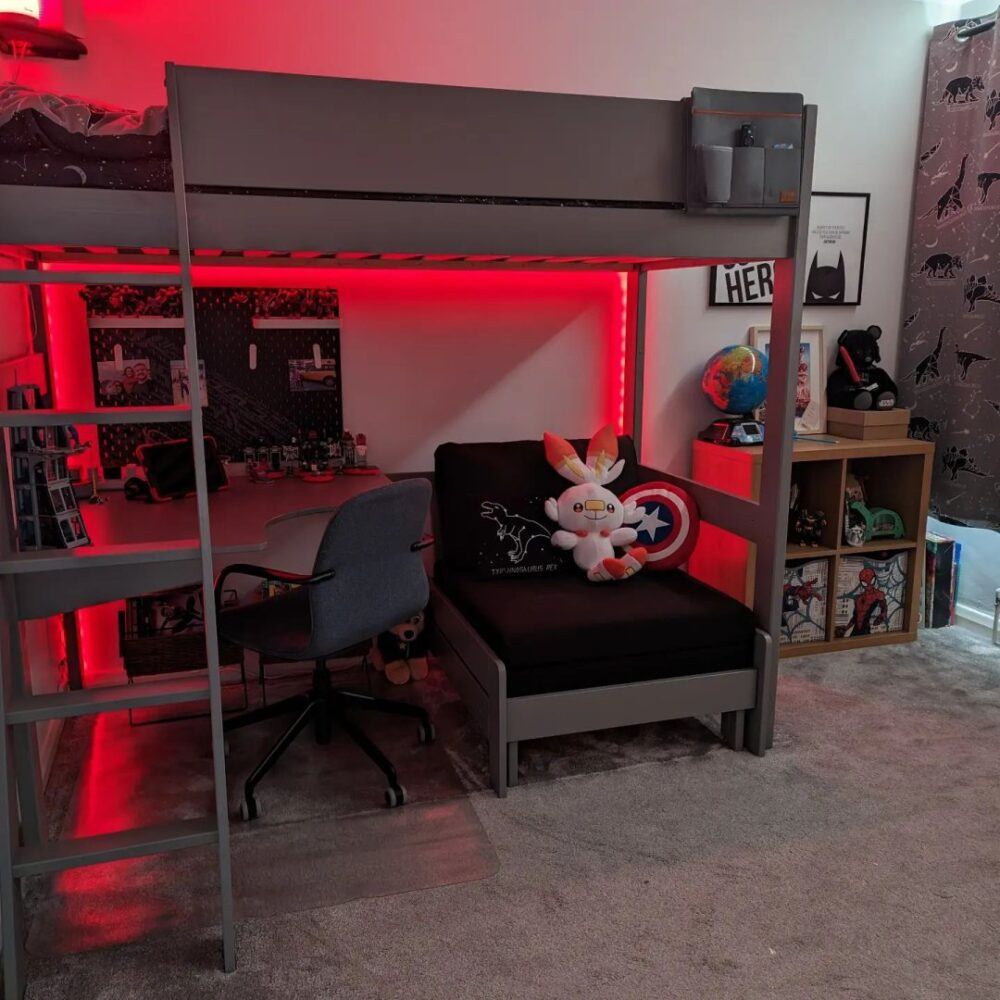 A grey kids' high sleeper bed, styled with red LED lighting.