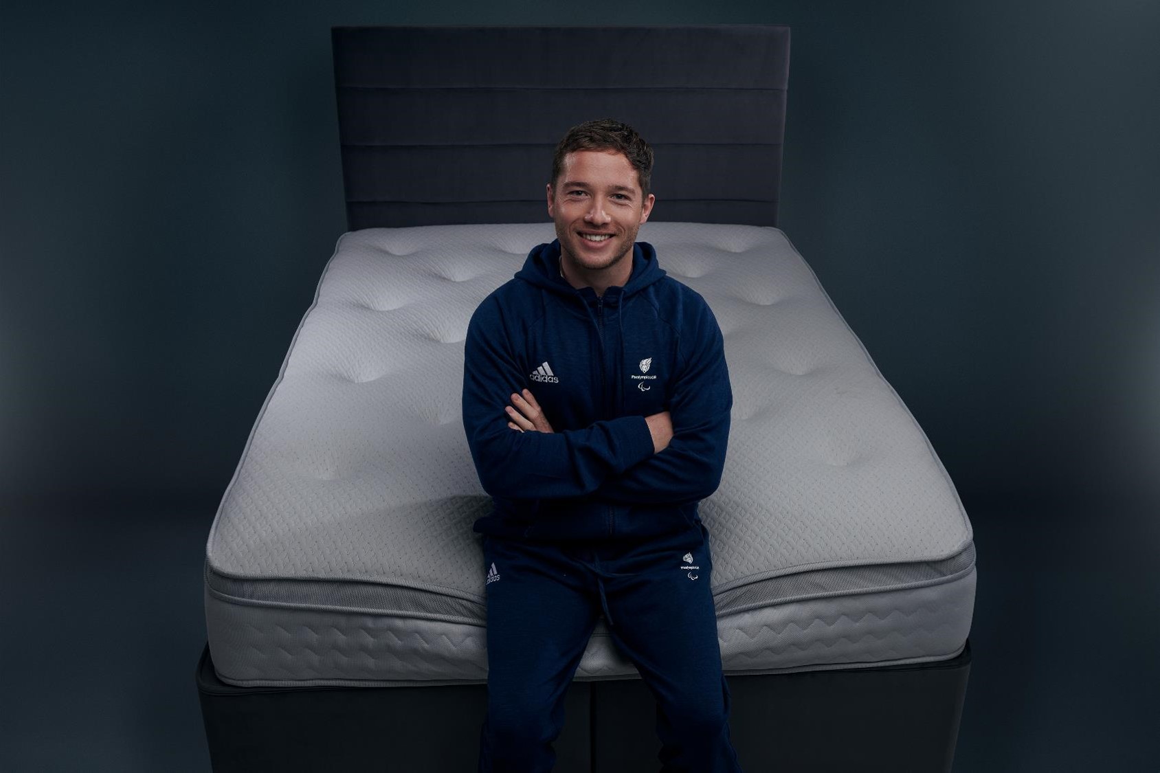 Alfie Hewett OBE, ParalympicsGB wheelchair tennis star, sat on a Dreams mattress