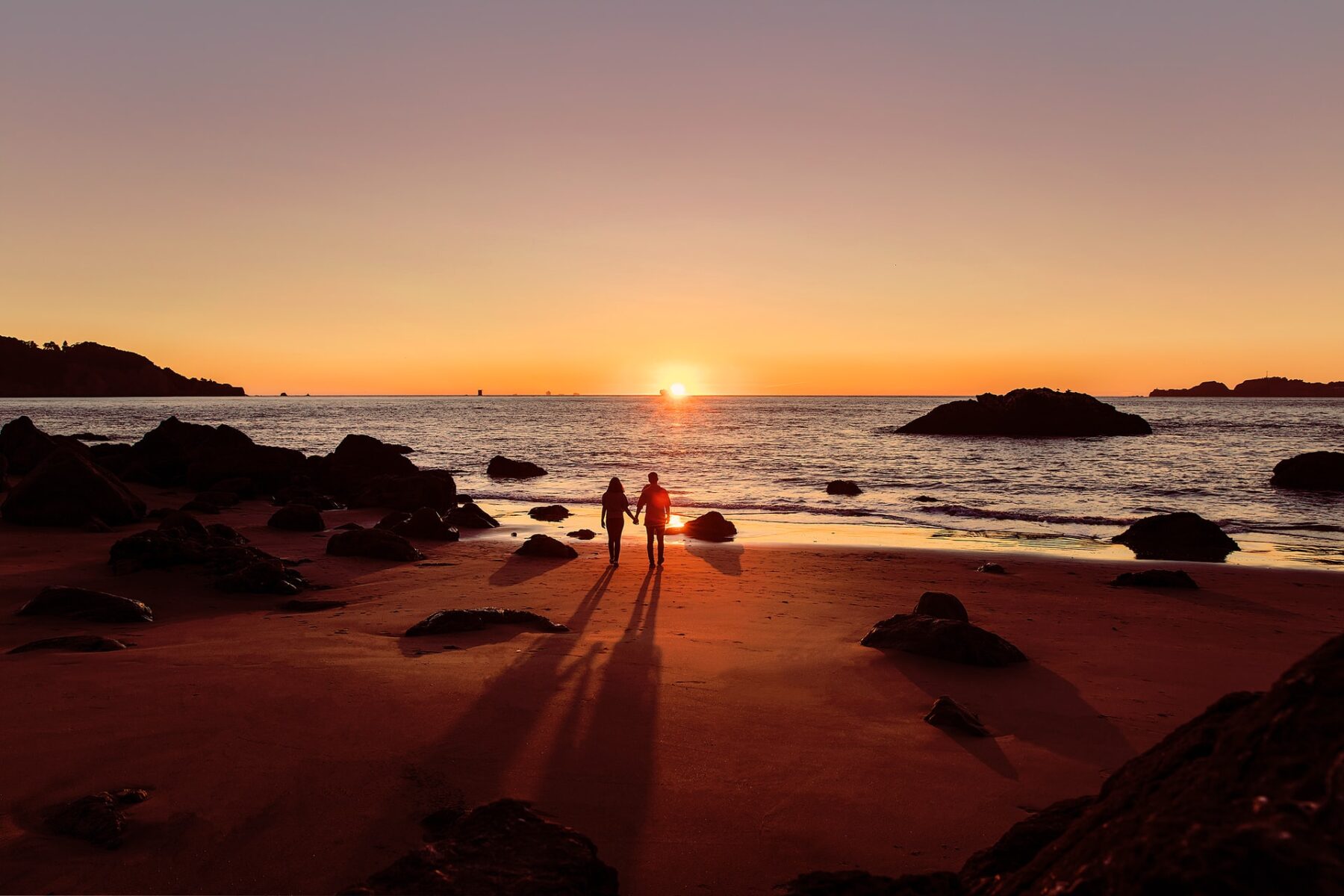 couple walking on beach