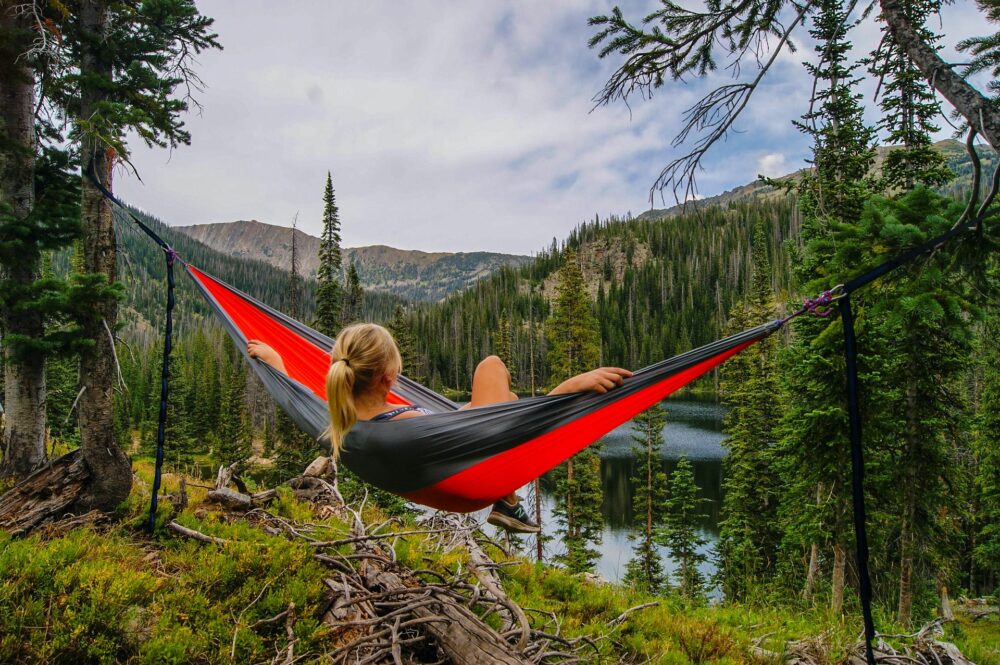 sleeping in hammock outdoors